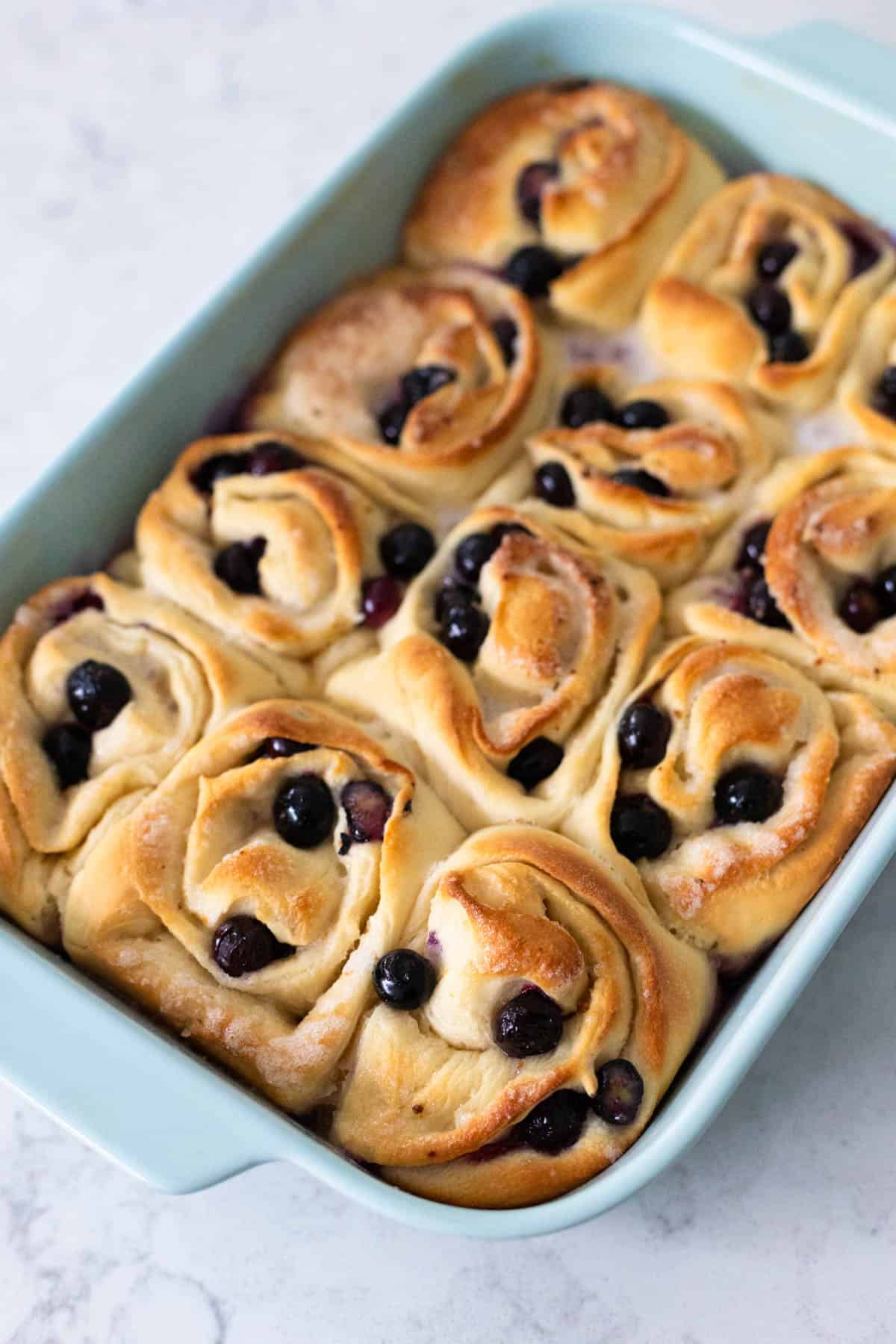 The rolls are fresh from the oven and golden brown.